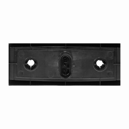 Rear of a safety light on a white background