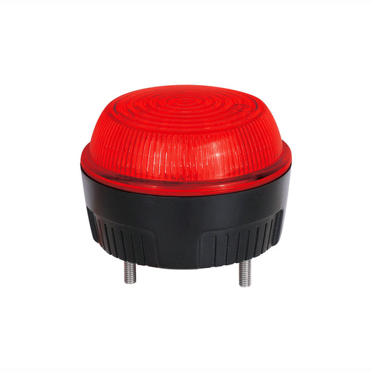 Red industrial warning light on a white background