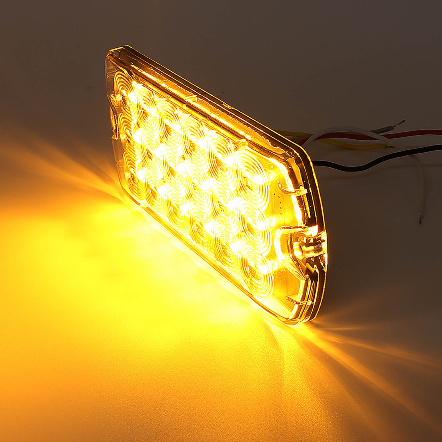 Yellow LED light on a dark background