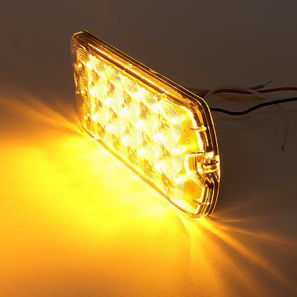 Yellow LED light on a dark background