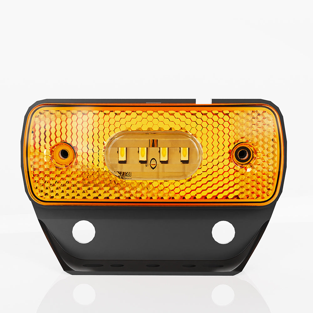 Amber reflective traffic safety light on a white background