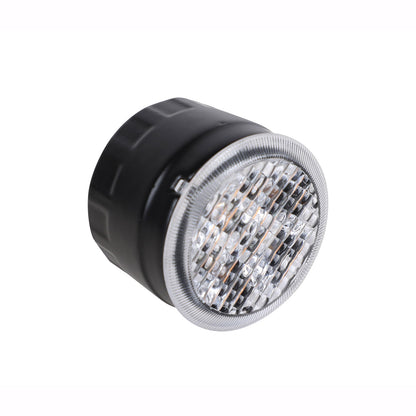 Black and silver LED light bulb on a white background