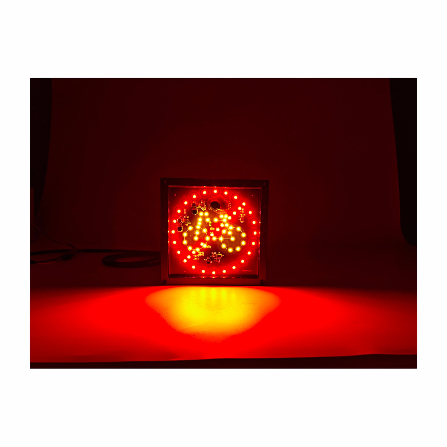 Illuminated Cycle warning light on a white background