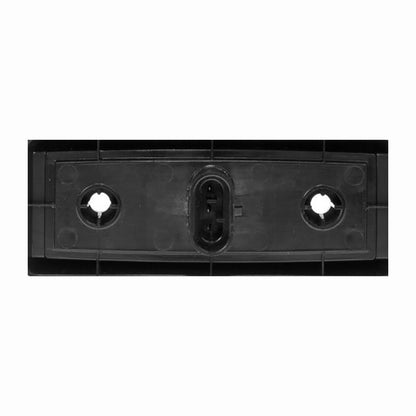 Rear of a safety light on a white background