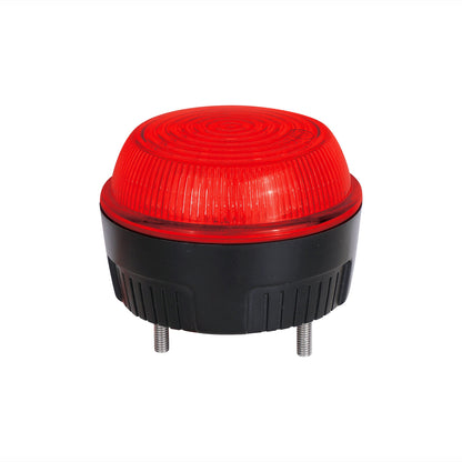 Red industrial warning light on a white background