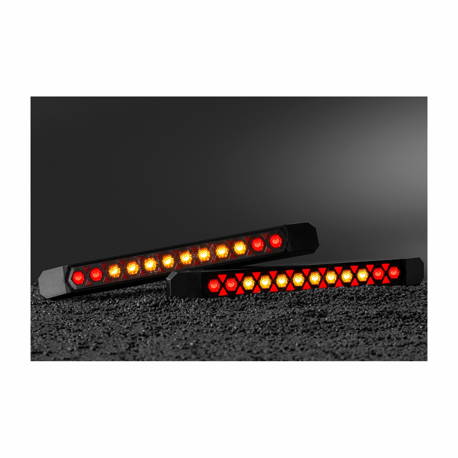 Two LED strip lights with red and yellow LEDs on a black background