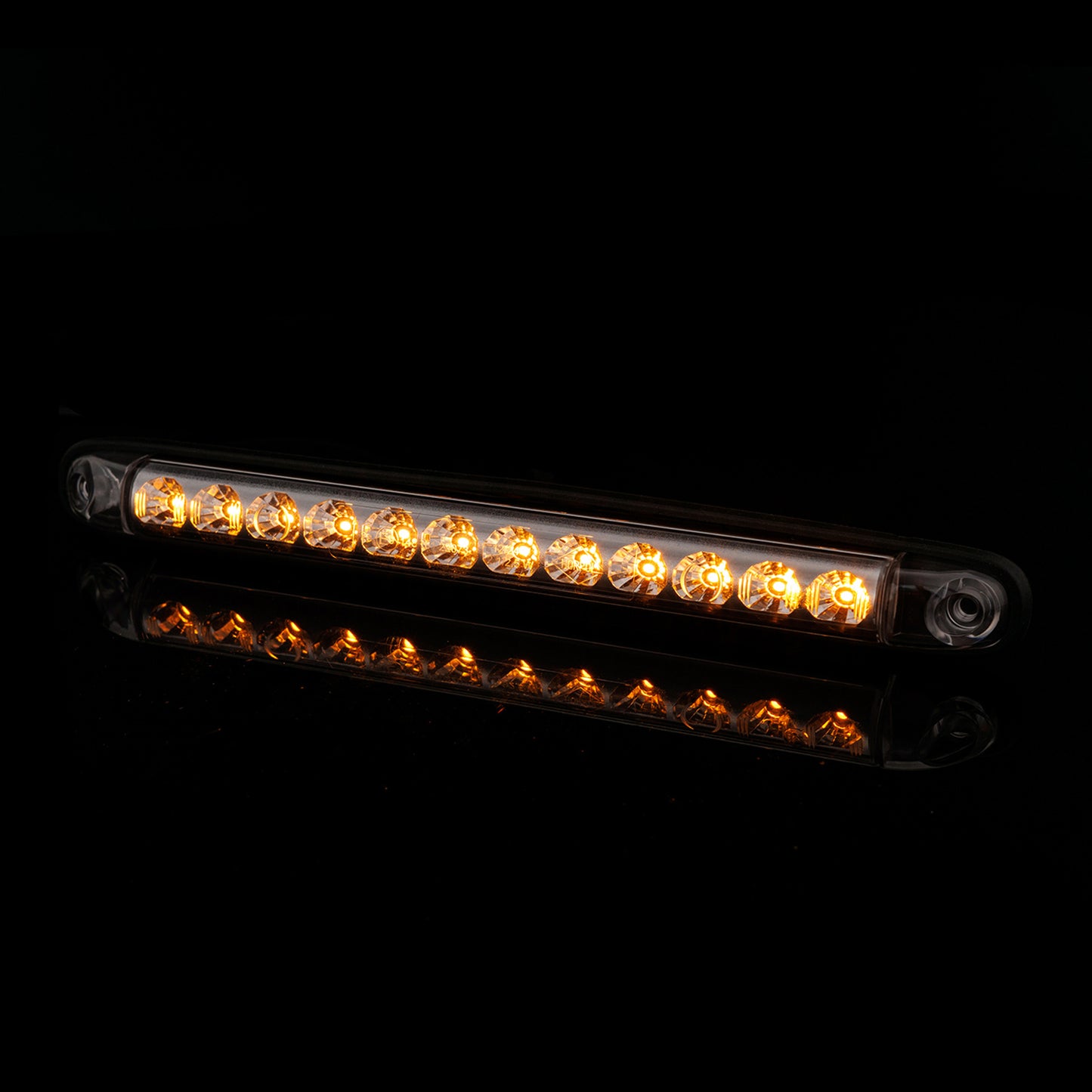 Row of amber LED lights on a black background
