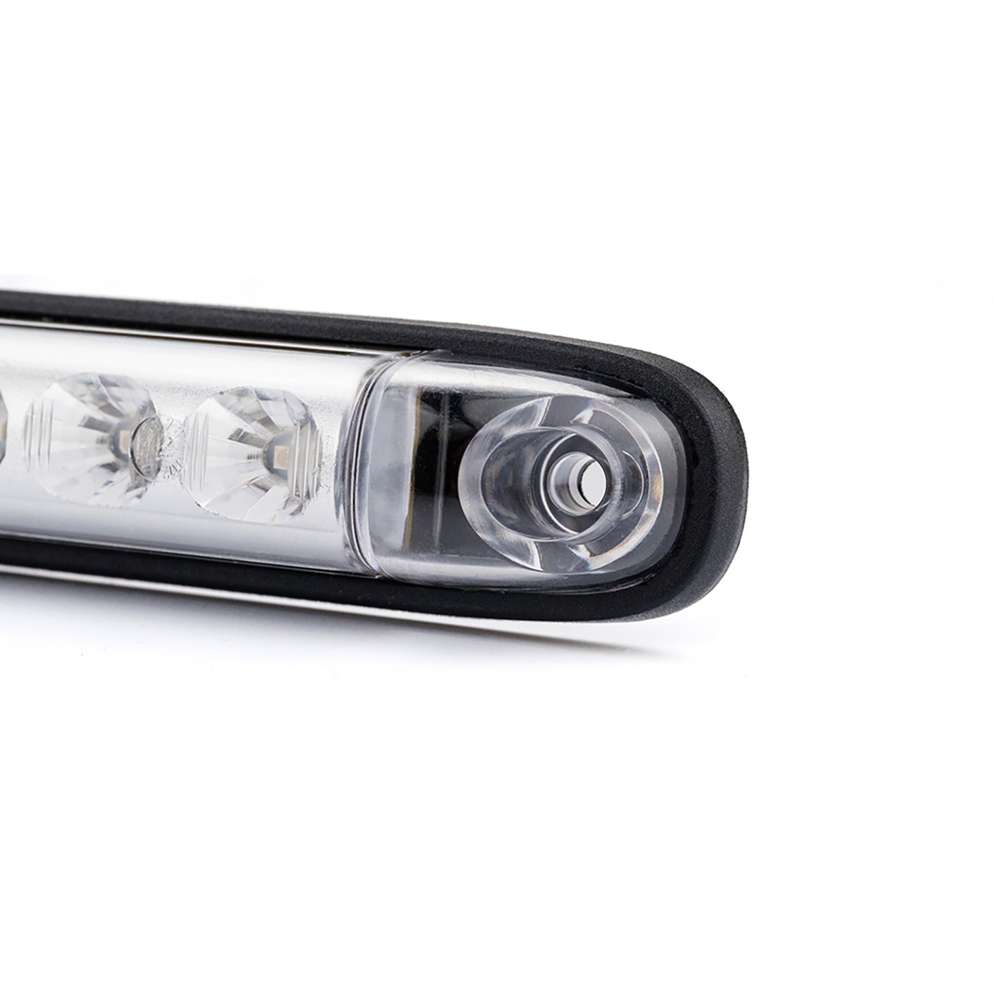 Close-up of a car light on a white background